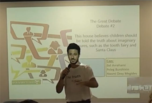 Student presenting at the Great Debates Event in the Department